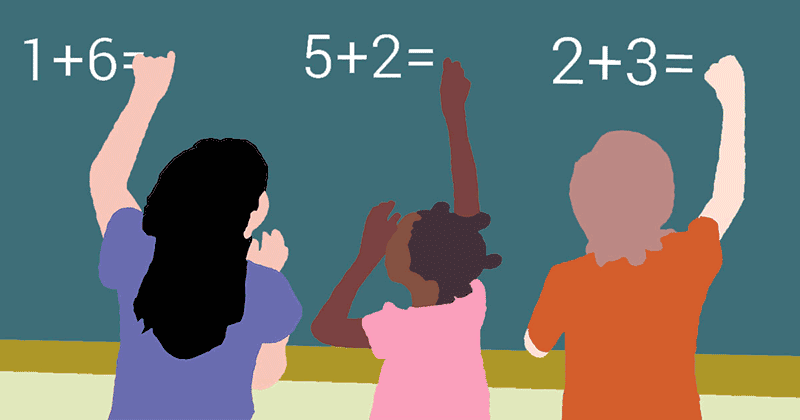 Kids doing maths on a school blackboard